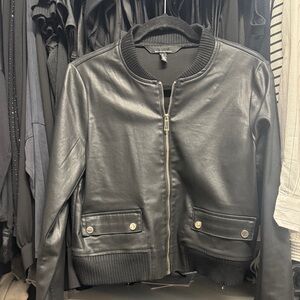 White House Black Market Black coated bomber jacket.